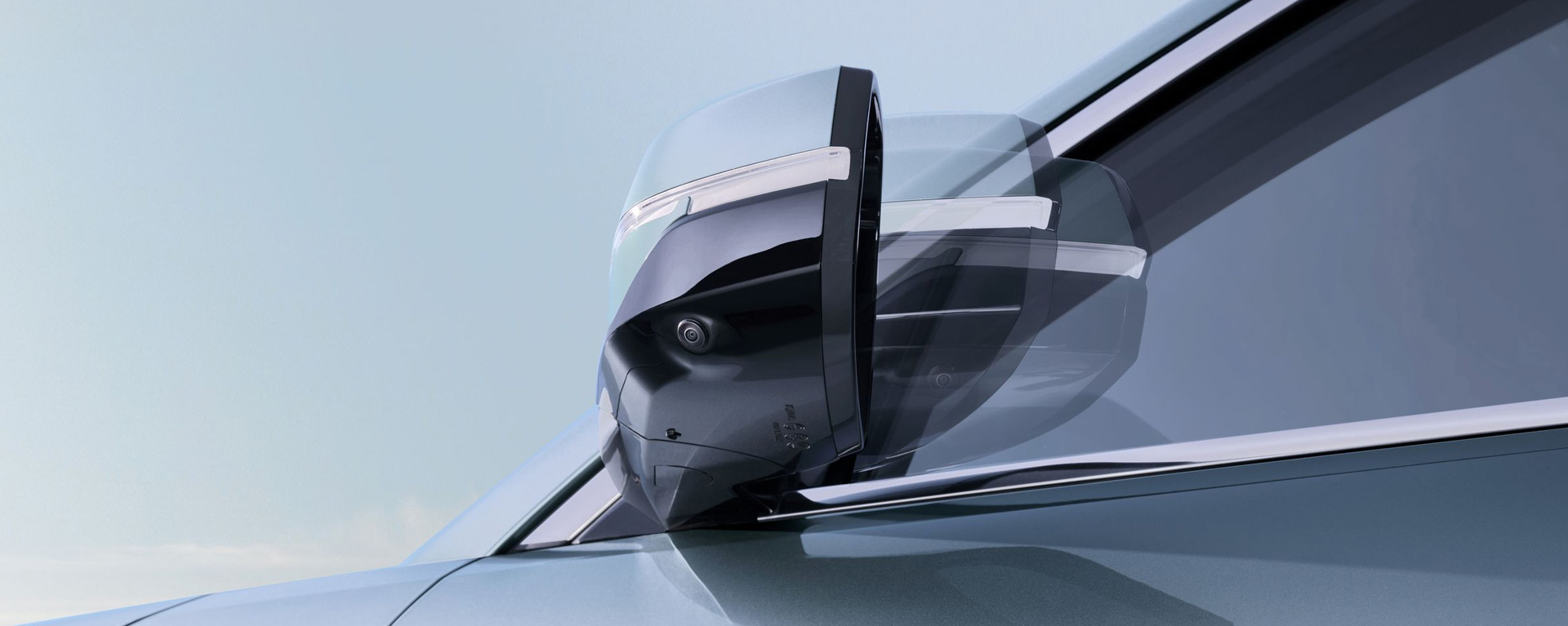 Heated side mirrors with automatic adjustment